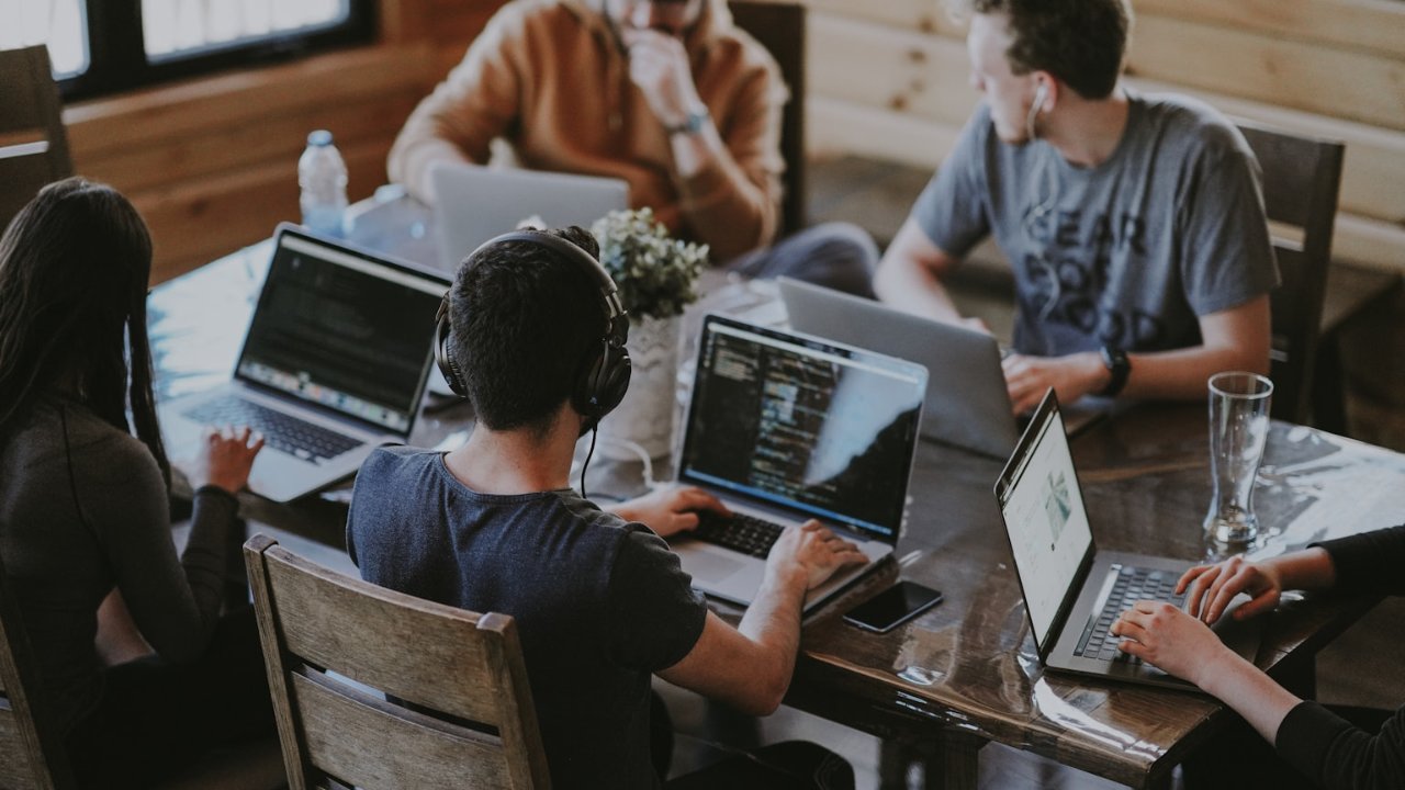 The AI Hub Global editorial team collaborating in a modern office